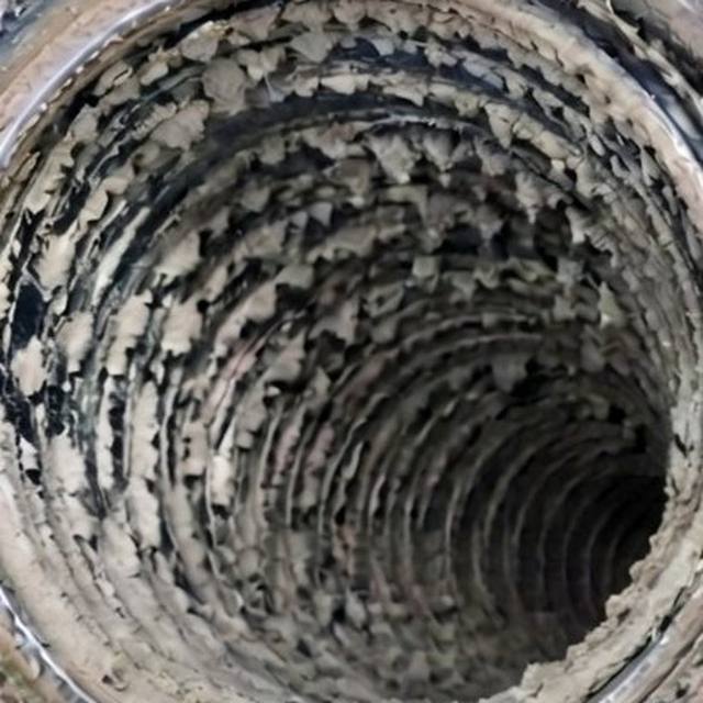 Dust and debris built up inside an uncleaned AC duct in a Dubai property